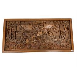 Carved hardwood coffee table, the rectangular inset carved with mythical battle scenes involved cavalry and dragon pulled chariots with arches outside a walled city, the frieze and apron profusely carved with repeating foliate decoration and flower heads, raised on cabriole supports