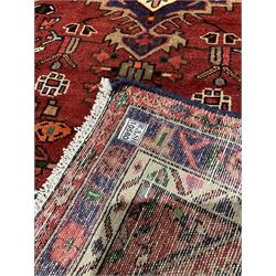 Kashan runner rug with red field and all over geometric design 