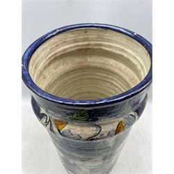 Continental glazed earthenware stick stand of cylindrical form painted with Calla Lily's, H54cm  