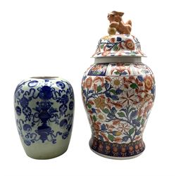 Large Chinese baluster form vase and cover decorated in the Imari palette with Dog of Fo finial H51cm, together with a Chinese blue and white vase of ovoid form (2)