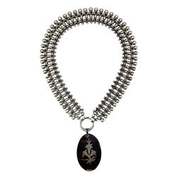 Victorian silver book chain necklace with a similar age silver inlaid tortoiseshell oval pendant 