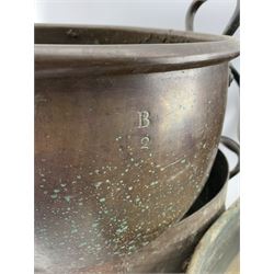 Victorian copper two handled cooking pan of lozenge shape 66cm x 50cm, an oval pan 41cm, another 45cm and a circular pan 39cm, three initialled 'B' (4)