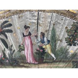 18th century fan, the horn sticks and guard with silvered and gilded decoration, the silk leaf painted in strong colours with a young couple in a garden setting, within a border of gold coloured sequins, framed and glazed, L55cm x H35cm. Provenance: From the Estate of the late Dowager Lady St Oswald