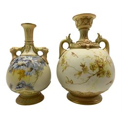 Late Victorian Royal Worcester Persian style, vase of globular twin handled form, the ivory ground painted with Butterflies, flowers and foliage, on circular moulded foot, with puce printed marks beneath including shape number 1574, and date code for 1892, H25.5cm, together with a similar style vase, with twin mask handles,  with puce printed marks beneath including shape number 1626 and date code for 1894 (2)