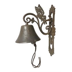 Cast iron exterior hanging garden bell with decorative butterfly bracket