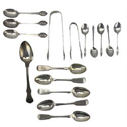 Small quantity of silver cutlery, including two pairs of sugar tongs, three teaspoons with lawn bowls finials, set of five apostle coffee spoons, etc