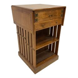 20th century walnut bookcase, drop-leaf top, fitted with small cupboard and drawers, moulded plinth base on castors
