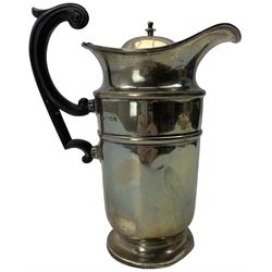 Silver hot water jug with stained wooden handle and circular foot H20cm Birmingham 1910 Maker Stewart Dawson & Co