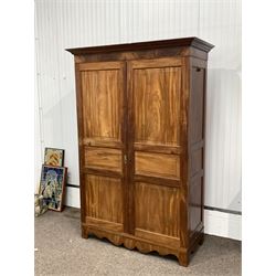 Late 19th century figured mahogany double wardrobe, projecting cornice over two panelled doors enclosing an interior converted for hanging, W143cm, H215cm, D63cm