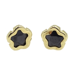 Pair of gold stone set star stud earrings, stamped 9K