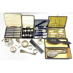 Art Deco etched glass and silver atomiser, Birmingham 1920, Edwardian cased set of small serving instruments with mother-of-pear handles, early 20th century silver backed brush and comb, boxed, cut glass scent bottle with silver collar, together with other dressing table jars and cutlery 