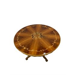 Mid-20th century circular breakfast table,  the circular top with marquetry inlay, raised on carved baluster base, leading into four splayed supports 