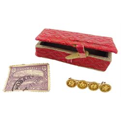 Early 20th century Chinese gold brooch, four circular disks with character marks, the reverse stamped KW, in original box with handwritten note dated 08
