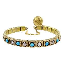 Victorian gold turquoise and diamond bangle, the sprung bangle formed of foliate cast square links, the front set with old cut diamonds and turquoise, secured with a chain with a foliate cast ball, total diamond weight approx 0.70 carat