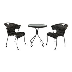 Circular glass and metal conservatory table (D64cm, H72cm); together with two rattan armchairs 