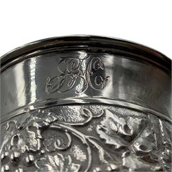 George III silver mug with leaf capped handle, later chased decoration and on a pedestal foot H10cm London 1818