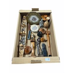 Group of carved figures, agate clock, wooden model of a boat with figures etc in one box