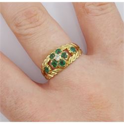 9ct gold emerald and diamond flower head cluster ring, with pierced leaf design emerald set shoulders, London 1976