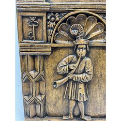 Reproduction panel after the 16th century Percy family oak panels found in the Percy Inn on Walmgate - York, depicts a man playing horn, above the musician are four Percy badges, the crescent moon, the crowned key, the bugle-horn and the pair of manacles 50cm x 32cm