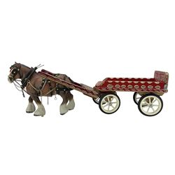 Two pottery cart horses and carts and a traveller's caravan