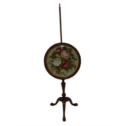 Victorian mahogany pole screen, pinecone finial over the circular embroidered screen, the turned support terminating in tripod base with cabriole supports 
