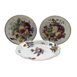 Pair of early 19th century Derby plates painted with fruit within a gilt border D22cm and a Derby shaped oval dish painted with sprays of flowers with a gilt border W28cm, painted red marks (3)