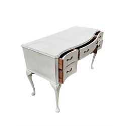 Painted kneehole desk, fitted with five drawers, raised on cabriole supports, together with a white painted chair 