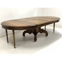 Victorian walnut oval extending dining table, the top raised on an octagonal column and four scrolled splayed supports with brass castors, decorated with incised ebonised detail, with two additional leaves,
