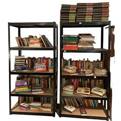 Quantity of assorted books including Encyclopedia, novels, reference books etc. on nine shelves