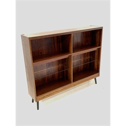 Troeds of Sweden - Mid century rosewood open bookcase, with two fixed shelves and two adjustable glass shelves, raised on ebonised tapered and splayed supports 