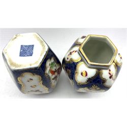 Pair of Paris porcelain hexagonal vases, decorated with panels of birds and insects on a scale blue ground and with 'Worcester' hatched square mark, probably Samson of Paris  H9.5cm