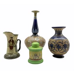 Early 20th century Royal Doulton Dutch scene tobacco jar, a Wedlocks Joys pitcher, Doulton Slaters Patent Chine Ware vase of globe and shaft form with floral decoration within stiff leaf borders, H40cm and a Doulton Lambeth vase (4)