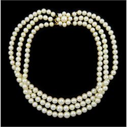 Triple strand graduating cultured pearl necklace, with 9ct gold pearl cluster clasp, Birmingham 1977