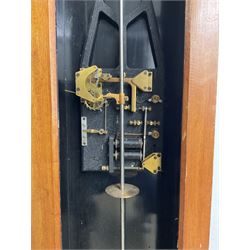 1950’s Synchronome master clock movement and pendulum in a mahogany case. 
