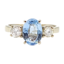 18ct gold three stone oval aquamarine and round brilliant cut diamond ring, hallmarked, aquamarine aprpox 1.20 carat, total diamond weight approx 0.30 carat