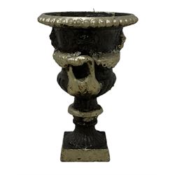 Small pair of 20th century cast iron Campana-shaped urns