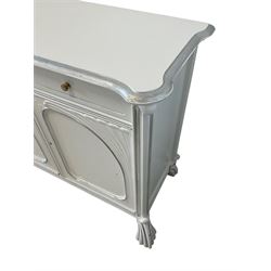 French design white finish sideboard, rectangular top with canted corners and painted silver banding, fitted with four drawers over four panelled cupboards, reeded lower edge over splayed lobed feet