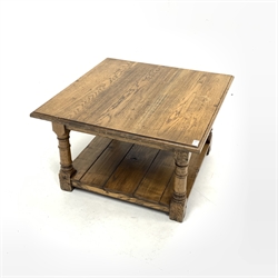 Solid oak coffee table, with square top raised on turned and block supports, united by under tier, 76cm x 76cm, H46cm