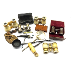 Three pairs of 19th/ early 20th century turned ivory binoculars, one with leather case, a pair of mother-of-pearl opera glasses, marked Selfridges London, 18th/ 19th century toddy ladle, a 19th century bone handled corkscrew and miscellanea in one box
