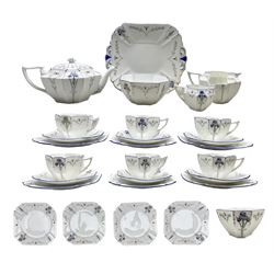 1920s Shelley Queen Anne shaped tea service, decorated in the Blue Iris pattern no. 11561, comprising a teapot, six cups, saucers & tea plates, two sugar bowls,  cream jug, milk jug (a/f), sandwich plate and four small plates