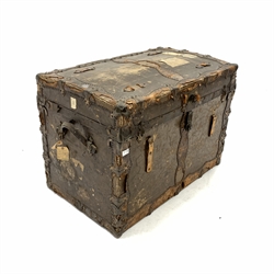 Early 20th century American steamer trunk, leather and metal bound, with scraps of old paper labels, W96cm