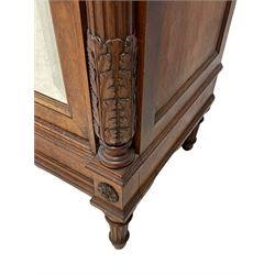 20th century French walnut armoire, the gadroon carved shaped top over bay leaf garland, bevelled door enclosed by two acanthus carved fluted columns, the birds eye maple and oak interior fitted with hanging rail and drawer, inlaid with lozenge parquetry work and mounted by carved flower head roundels, on turned and fluted feet