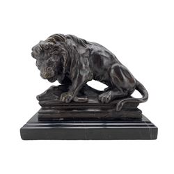 After Antoine-Louis Barye, 20th century patinated metal study of a lion and boar, on black marble base, L30cm x H25cm