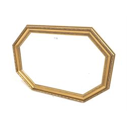 20th century octagonal gilt framed wall mirror with moulded frame enclosing bevelled mirror plate 89cm x 63cm