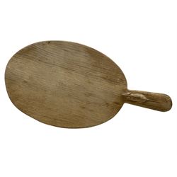 'Mouseman' oak oval cheeseboard with carved mouse signature, by Robert Thompson of Kilburn, L40cm 
