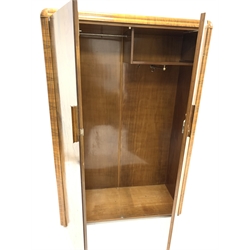 Early 20th century Art Deco well figured walnut wardrobe, two doors enclosing interior fitted for hanging, raised on block supports, W122cm, H184cm, D52cm