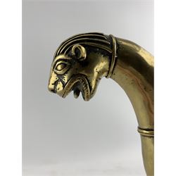 19th century Indian Mughal brass crutch handle, the hilt of v shape with terminals in the form of Tigers heads, on a knopped stem with beaded and rope twist decoration, raised on later oak stand, H26cm x W19cm