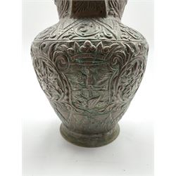 19th century Continental copper water vessel, embossed with panels of exotic birds, Dolphin, coat of arms, and a bust of a male figure, possibly Julius Caesar, with twin pouring spouts and an arched carry handle, H42cm
