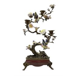 Contemporary bronzed candelabra in the form of a flower encrusted tree set with six porcelain birds in various positions, on faux wooden plinth with bronzed scroll supports, H55cm 