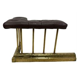 Victorian and later brass club fire fender in two sections, the corner seats upholstered in buttoned brown leather over plain spokes, the hammered base decorated with reeding and acanthus leaves, each base W66cm D36cm
